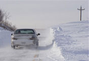 A car surrounded by snow